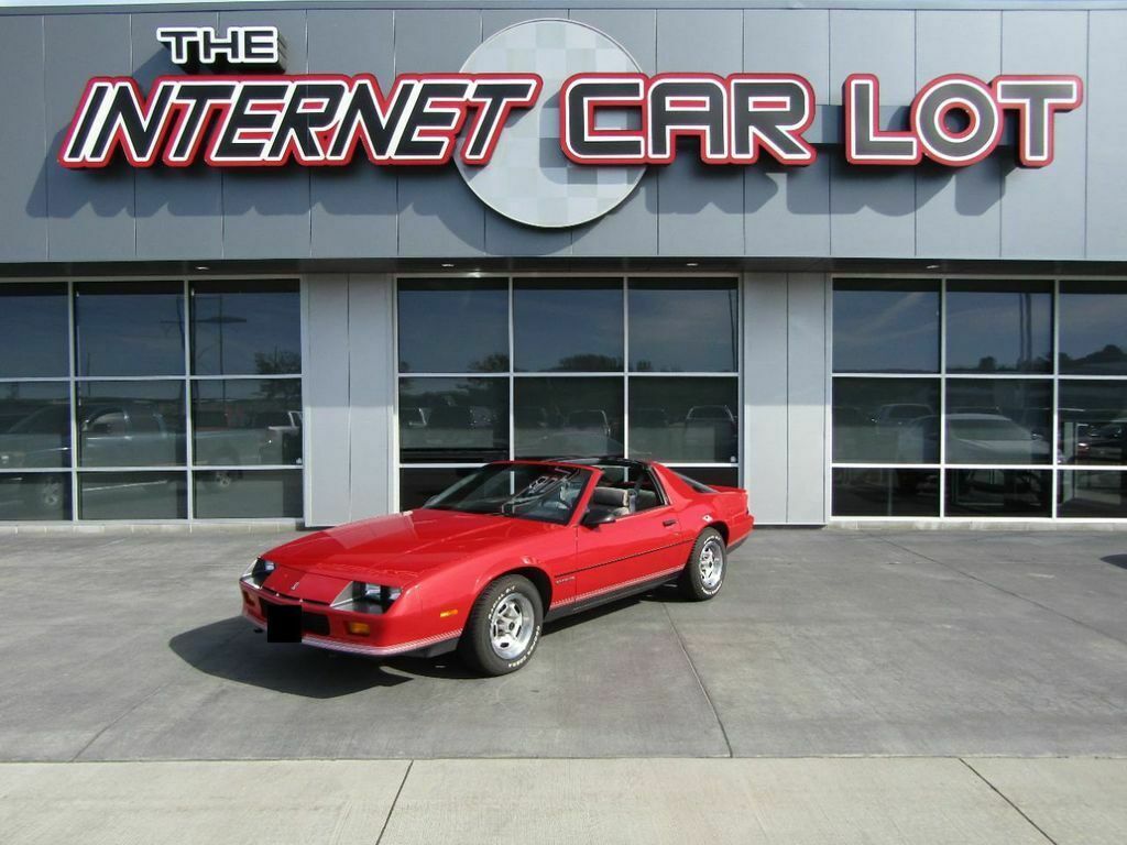 1987 Red Chevrolet Camaro --