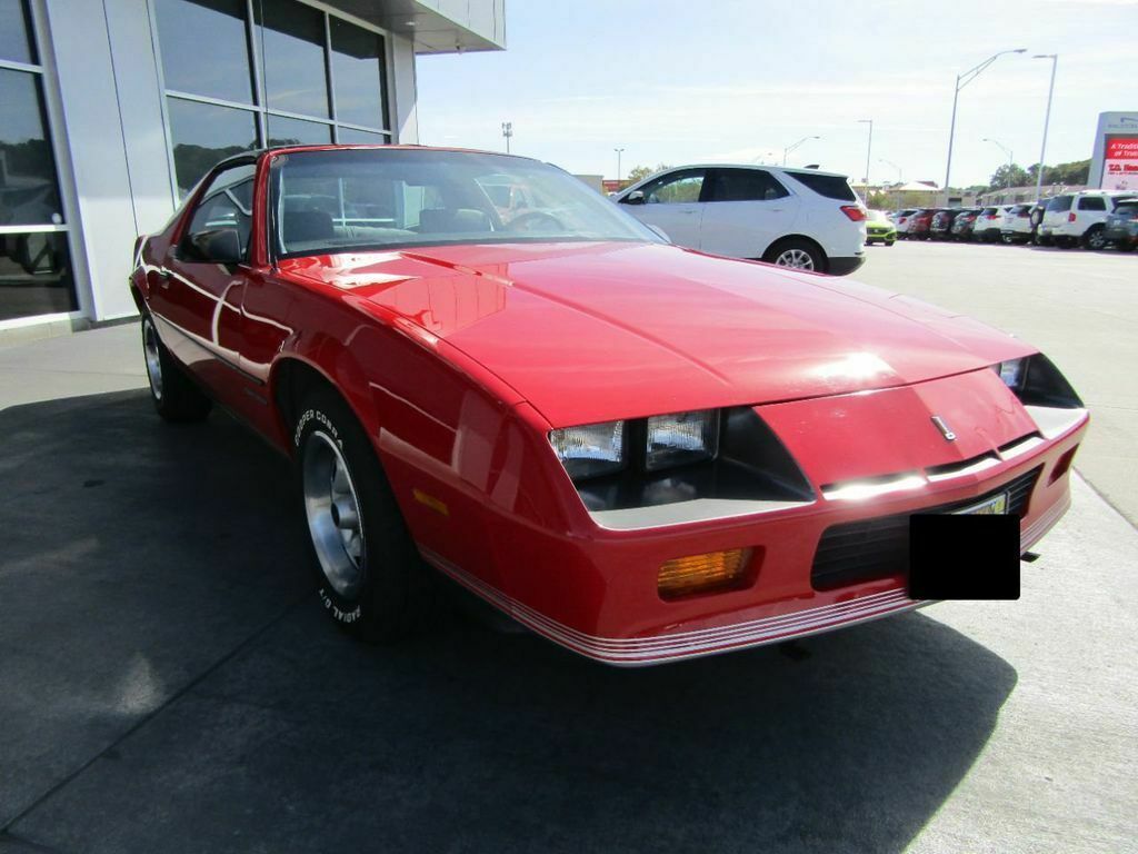 1987 Red Chevrolet Camaro --