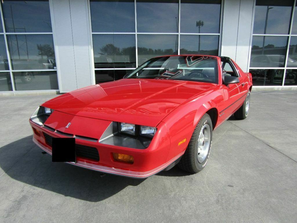 1987 Red Chevrolet Camaro --