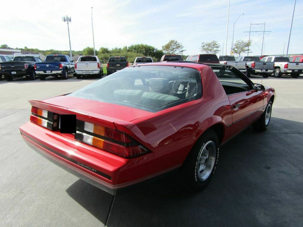 1987 Red Chevrolet Camaro --