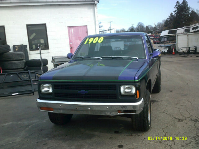 1987 purple Chevrolet S-10 truck