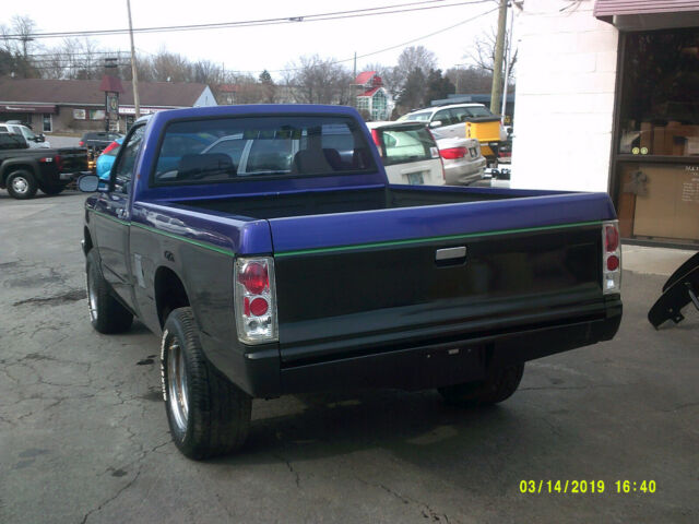 1987 purple Chevrolet S-10 truck