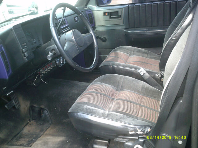 1987 purple Chevrolet S-10 truck