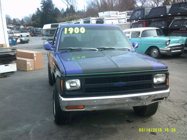 1987 purple Chevrolet S-10 truck