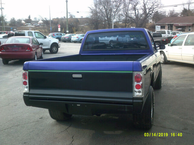 1987 purple Chevrolet S-10 truck