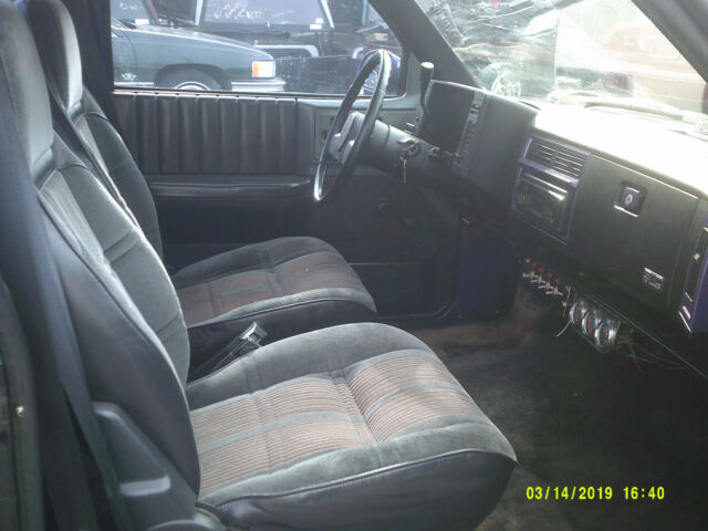 1987 purple Chevrolet S-10 truck