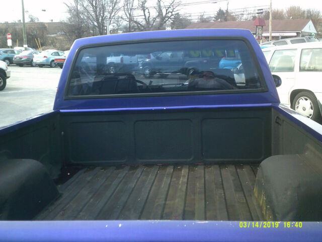 1987 purple Chevrolet S-10 truck