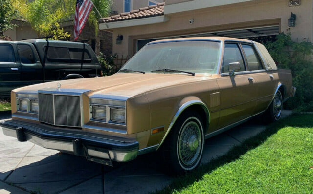 1987 Gold Chrysler 5th Avenue Sedan