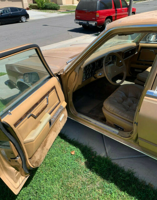 1987 Gold Chrysler 5th Avenue Sedan