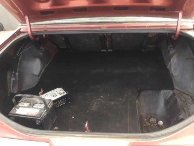 1987 Red Oldsmobile Cutlass Coupe