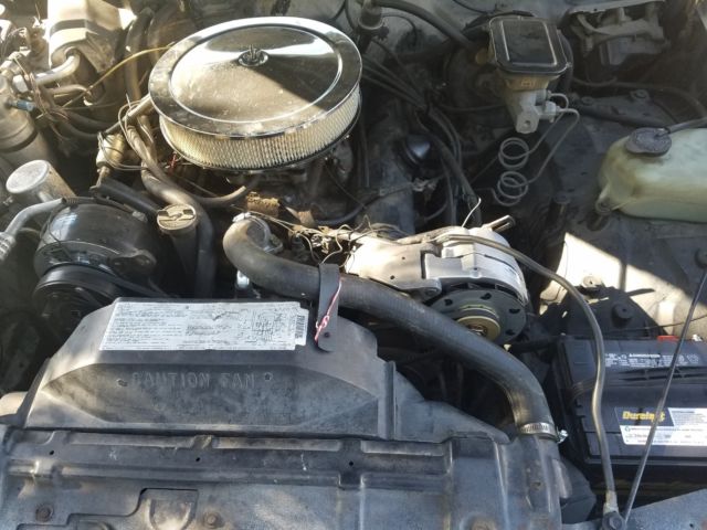 1987 Red Oldsmobile Cutlass Coupe