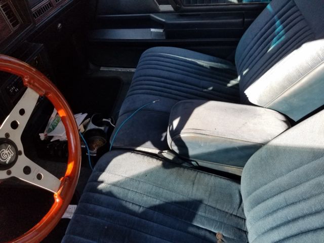 1987 Red Oldsmobile Cutlass Coupe