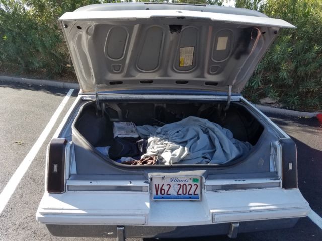 1987 Red Oldsmobile Cutlass Coupe