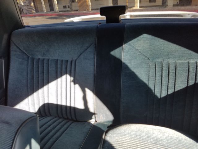 1987 Red Oldsmobile Cutlass Coupe