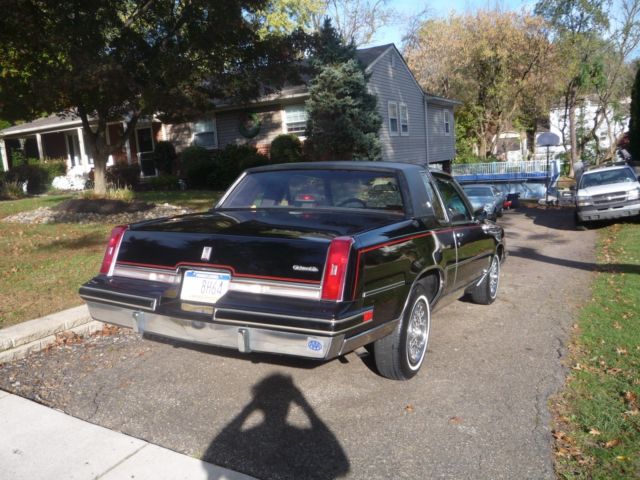 1987 Black Oldsmobile Cutlass Coupe