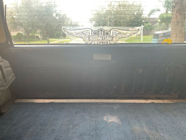 1987 Blue Ford Bronco Standard Passenger Van