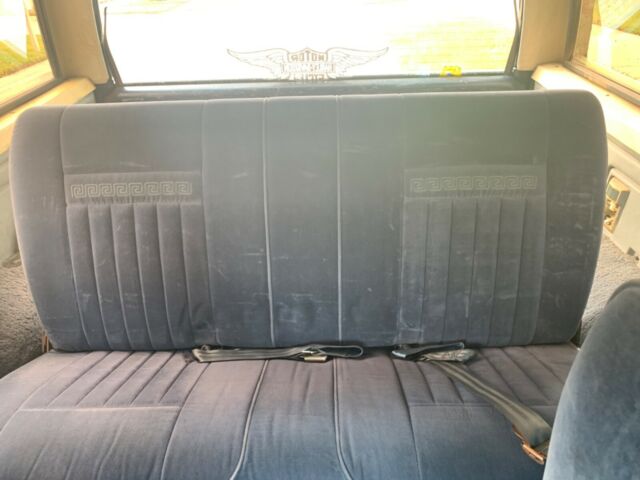 1987 Blue Ford Bronco Standard Passenger Van