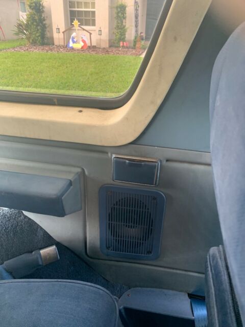 1987 Blue Ford Bronco Standard Passenger Van