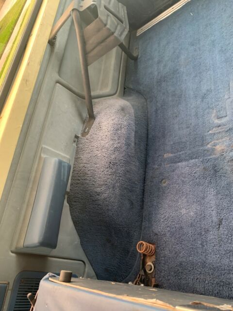 1987 Blue Ford Bronco Standard Passenger Van