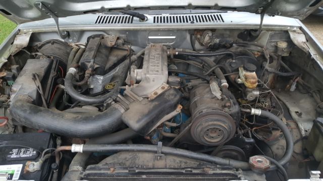 1987 Blue/Silver Ford Bronco II SUV