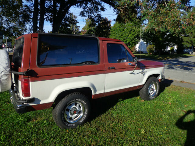 1987 Cream/Red Ford Bronco II SUV