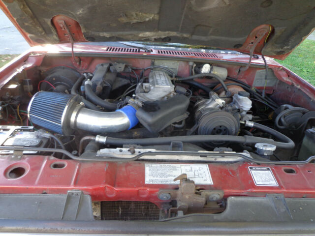 1987 Cream/Red Ford Bronco II SUV