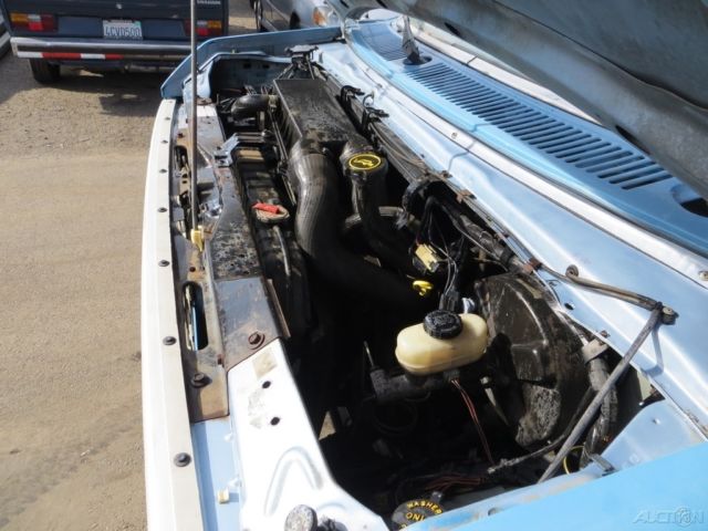 1987 Blue Ford E-Series Van