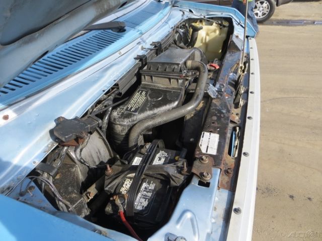 1987 Blue Ford E-Series Van