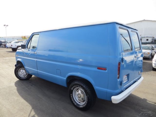 1987 Blue Ford E-Series Van