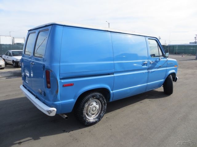 1987 Blue Ford E-Series Van