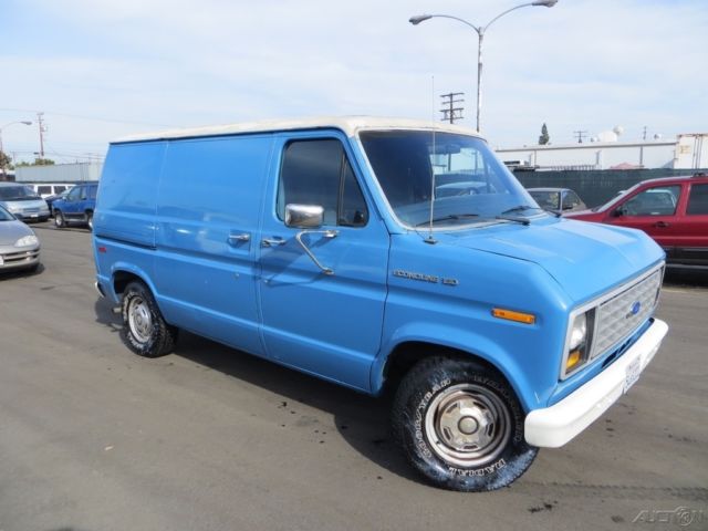 1987 Blue Ford E-Series Van