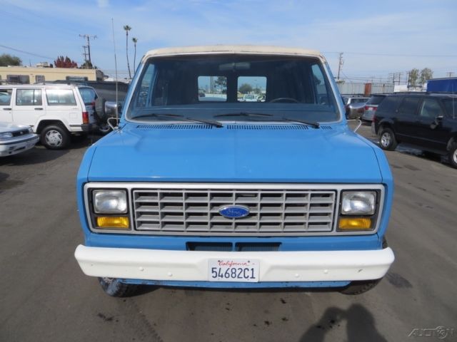 1987 Blue Ford E-Series Van