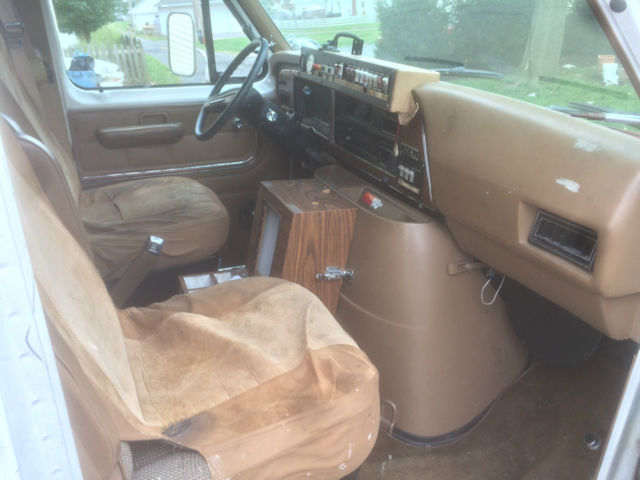 1987 red and white Ford E-Series Van full size fire ambulance ( retired)