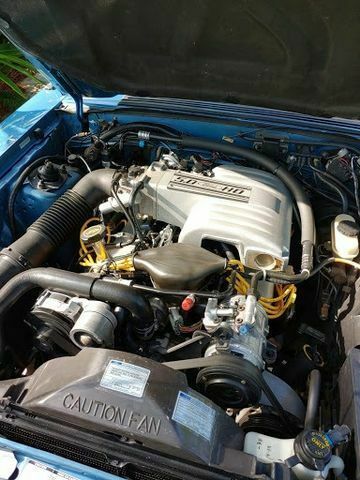1987 Blue Ford Mustang --