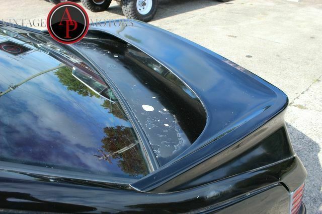 1987 Black Ford Mustang --