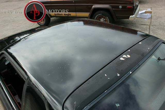 1987 Black Ford Mustang --