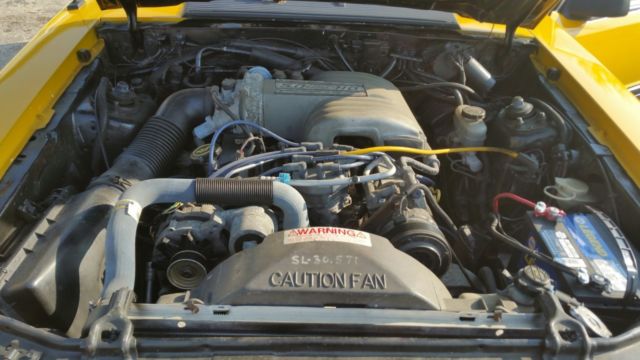 1987 Yellow Ford Mustang Coupe