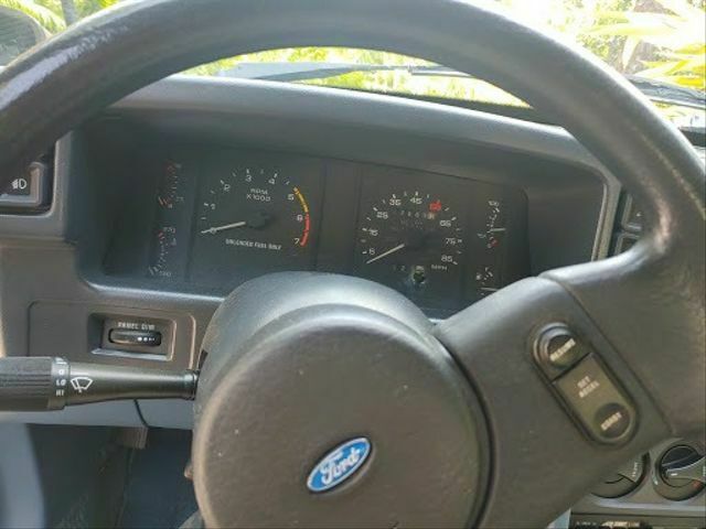 1987 Blue Ford Mustang --
