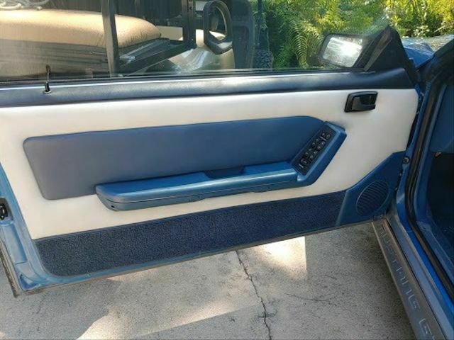 1987 Blue Ford Mustang --
