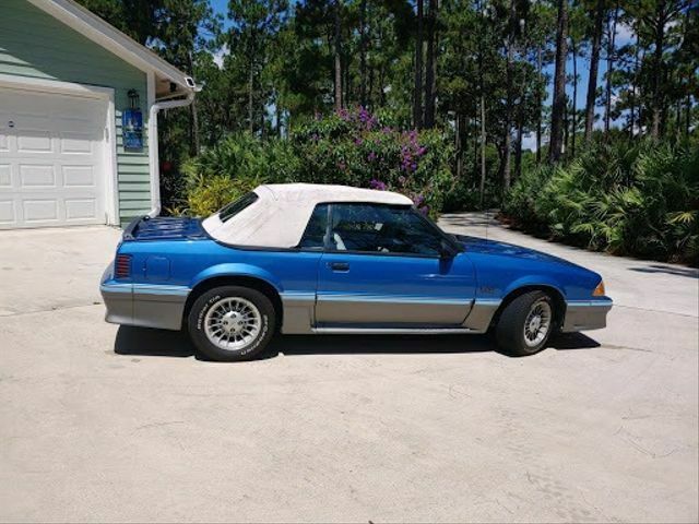 1987 Blue Ford Mustang --
