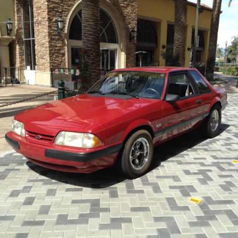 1987 Red Ford Mustang Sedan
