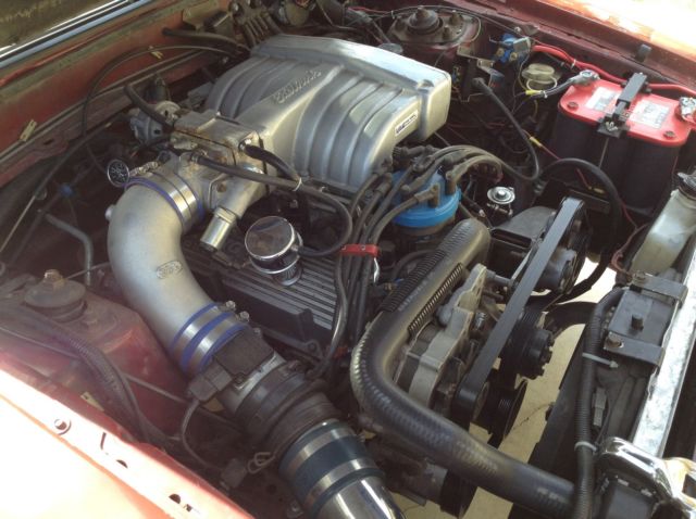 1987 Red Ford Mustang Sedan