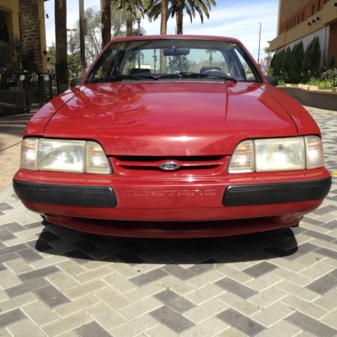 1987 Red Ford Mustang Sedan