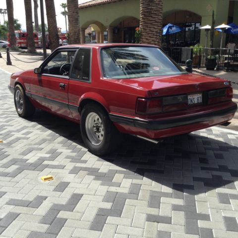 1987 Red Ford Mustang Sedan