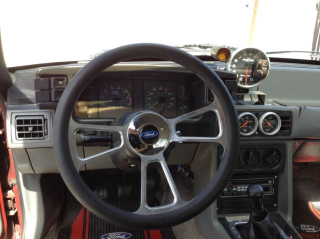 1987 Red Ford Mustang Sedan