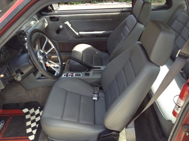 1987 Red Ford Mustang Sedan