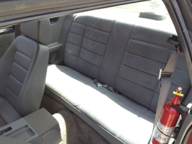 1987 Red Ford Mustang Sedan