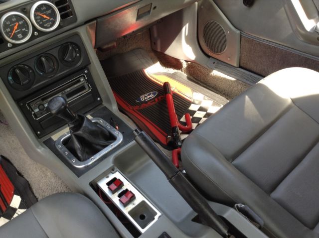 1987 Red Ford Mustang Sedan