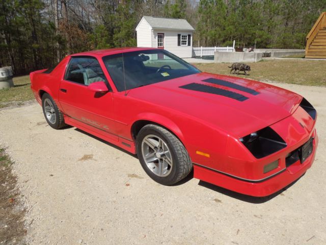 1987 red Chevrolet Camaro Coupe