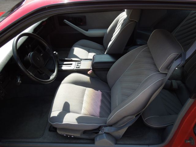 1987 red Chevrolet Camaro Coupe